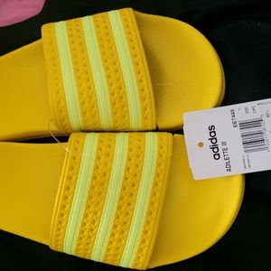 Yellow Adidas slides//sandals